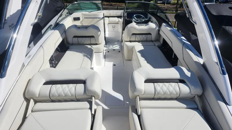 Slide: The Image of 2025 Regal LX6 boat interior with luxurious white seating and modern design. - 5