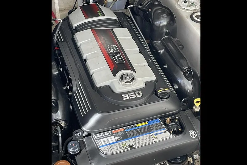 Slide: The Image of Engine of a 2019 Sea Ray 350 Sundancer boat, featuring a Mercury 6.2L V8. - 20