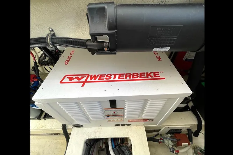 Slide: The Image of Westerbeke generator in a 2019 Sea Ray 350 Sundancer engine compartment. - 21