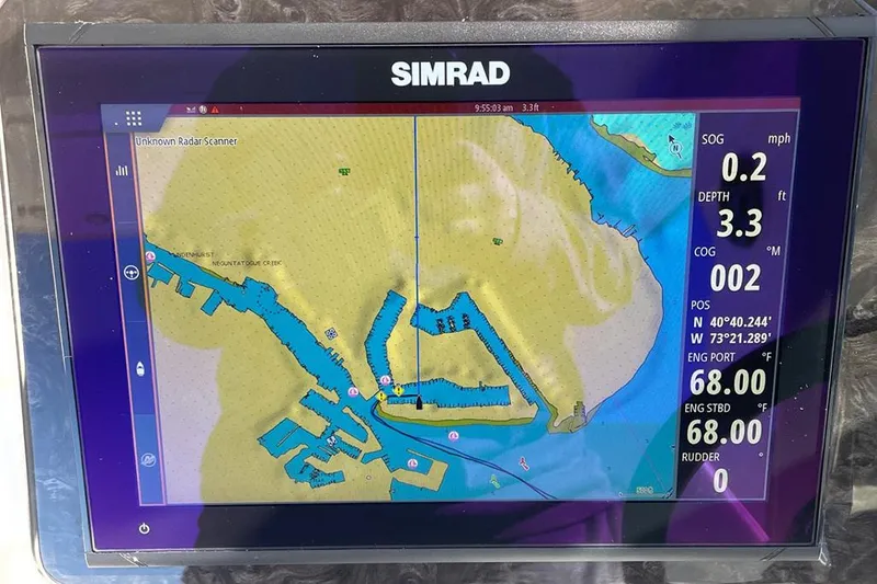 Slide: The Image of Simrad navigation display on 2019 Sea Ray 350 Sundancer, showing map and vessel data. - 7