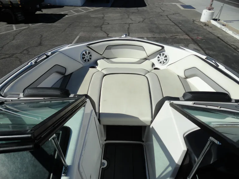 Slide: The Image of 2017 Yamaha Boats AR195 interior with spacious seating and sleek design. - 16