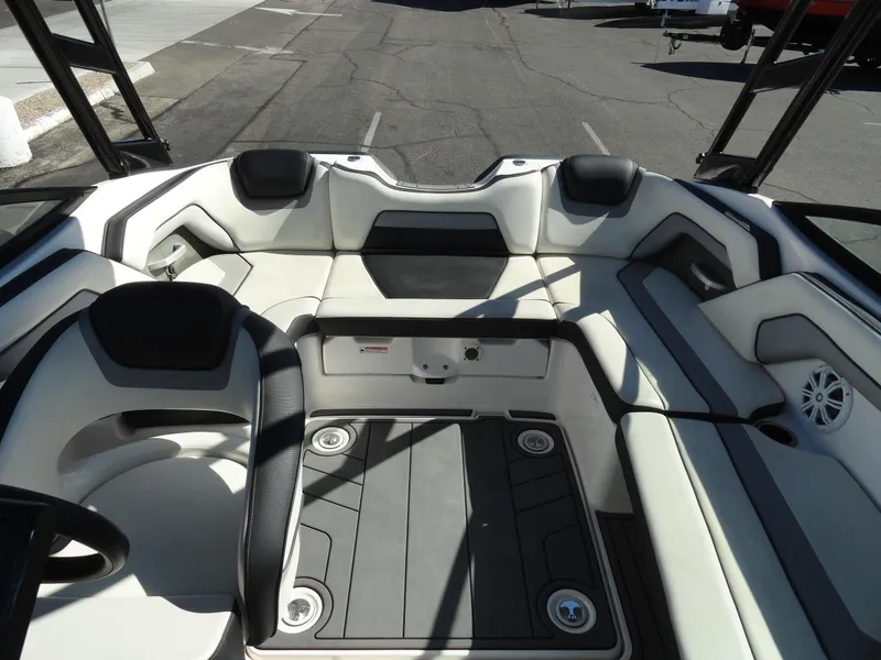 Slide: The Image of 2017 Yamaha AR195 boat interior with sleek seating and modern design. - 18