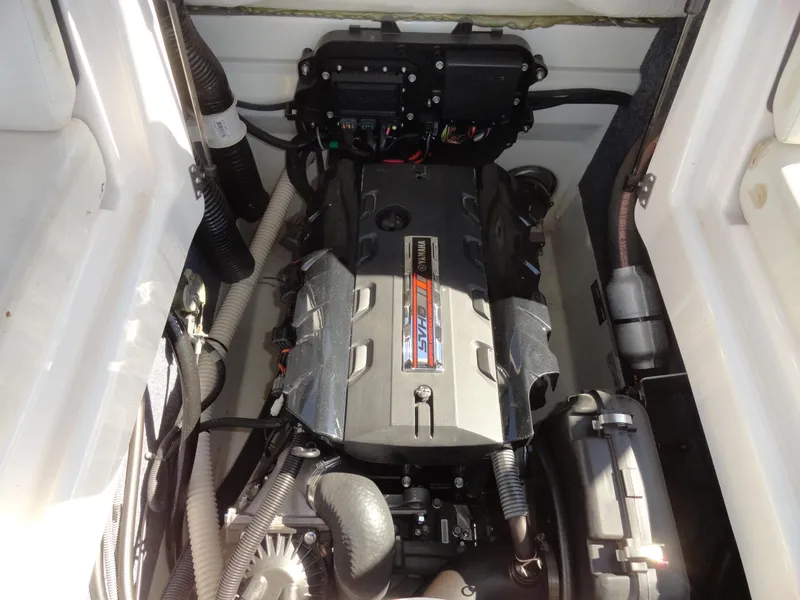 Slide: The Image of 2017 Yamaha AR195 boat engine compartment with detailed components. - 20