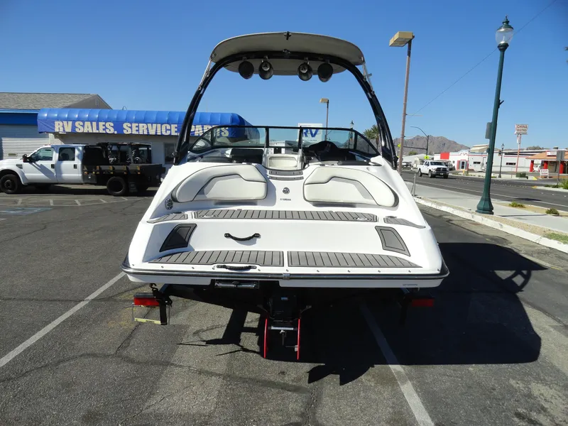 Slide: The Image of 2017 Yamaha AR195 boat in parking lot, rear view. - 23