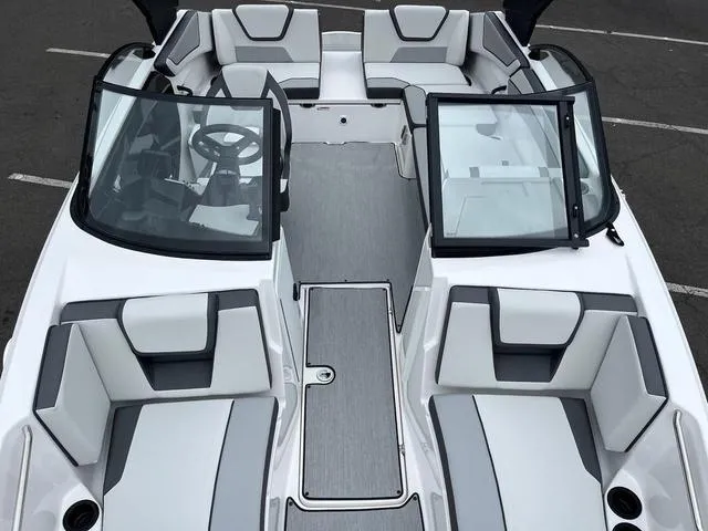 Slide: The Image of 2025 Yamaha Boats AR220 interior with sleek seating and modern design. - 3