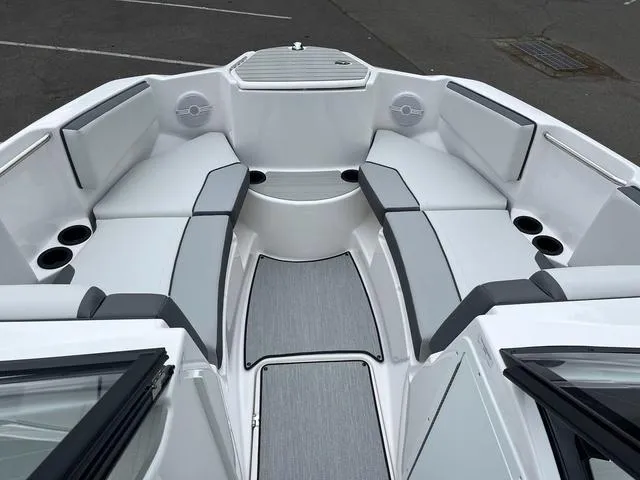 Slide: The Image of 2025 Yamaha AR220 boat interior with sleek seating and modern design. - 4