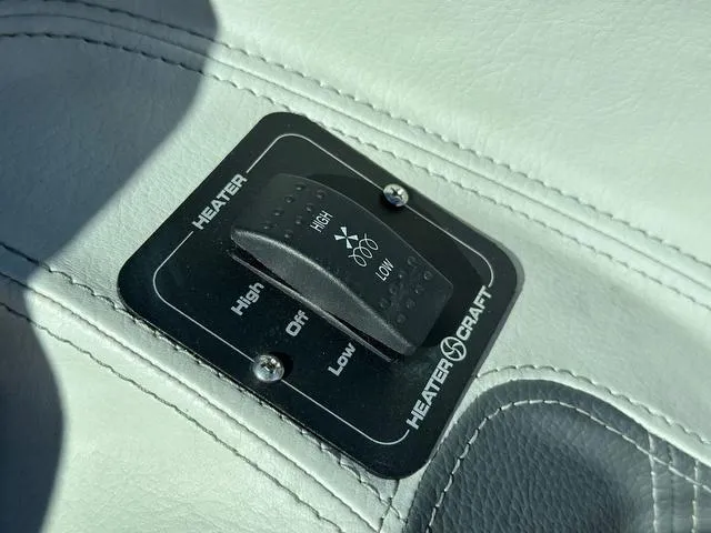 Slide: The Image of Heater control switch in 2021 Regal LS4 boat interior. - 12