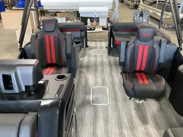 Slide: The Image of 2025 Bennington 24 MFB boat interior with stylish seating and modern design. - 17