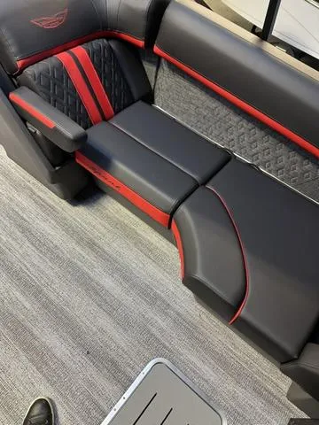 Slide: The Image of Luxurious seating in 2025 Bennington 24 MFB boat with black and red accents. - 3