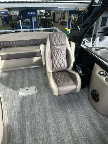 Slide: The Image of 2025 Bennington 25 QSBA boat interior with luxurious seating and modern design. - 6