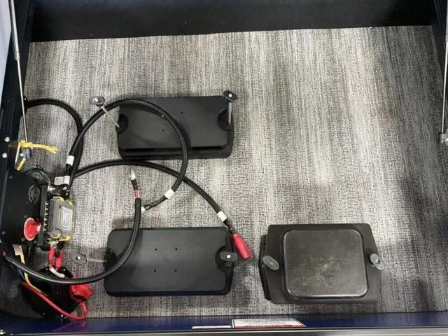 Slide: The Image of 2025 Bennington 22SSB-SPS boat interior with cushioned seating and blue accents. - 11