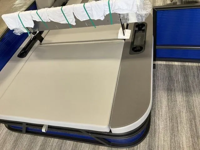 Slide: The Image of 2025 Bennington 22SSB-SPS boat dashboard with steering wheel and controls. - 13