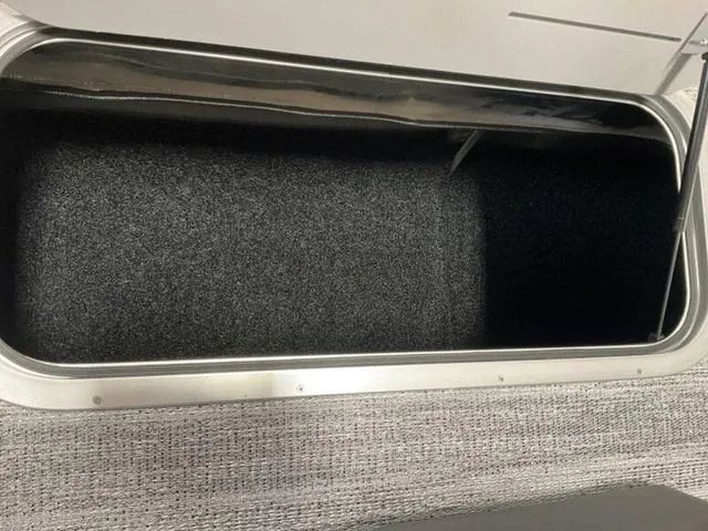 Slide: The Image of 2025 Bennington 22SSB-SPS boat seating in gray and black upholstery. - 18