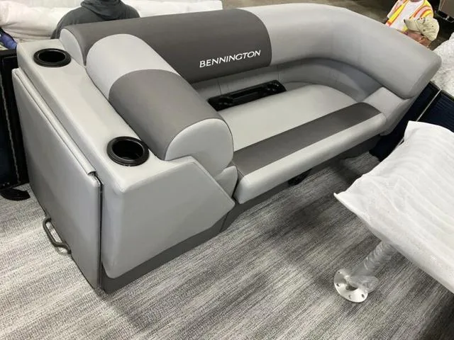Slide: The Image of 2025 Bennington 22 SSR boat seating, gray upholstery, cup holders, modern design. - 18
