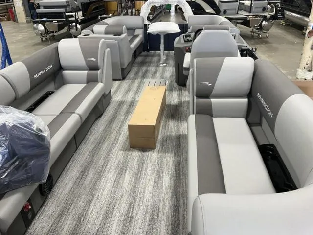 Slide: The Image of 2025 Bennington 22 SSR pontoon boat interior with gray seating and modern design. - 4