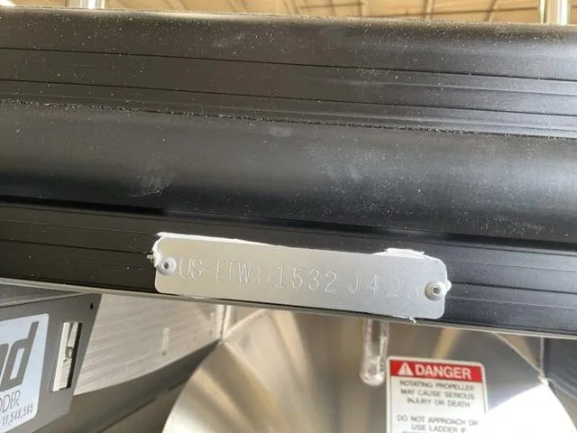 Slide: The Image of 2025 Bennington 23 SSB boat identification plate with warning label. - 10