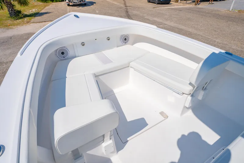 Slide: The Image of 2026 Albury Brothers 23 boat interior with white seating and speakers. - 17
