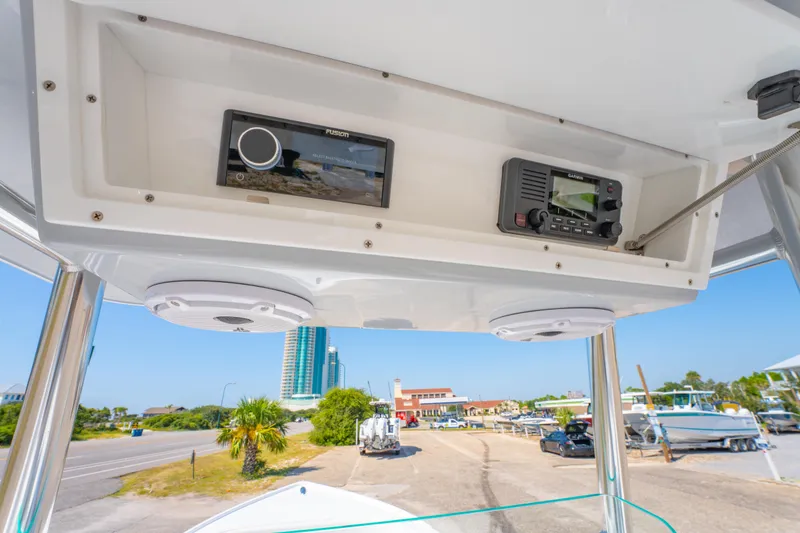 Slide: The Image of 2026 Albury Brothers 23 boat console with navigation and communication equipment. - 29