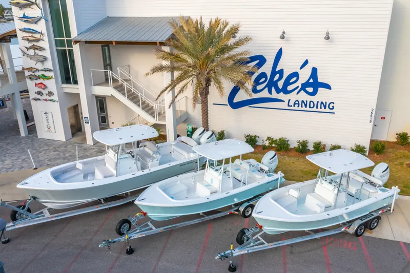 Slide: The Image of Three 2025 Albury Brothers 23 boats on trailers at Zeke's Landing. - 8