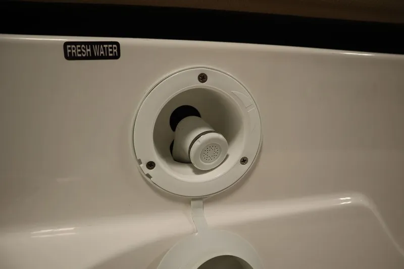 Slide: The Image of 2024 Bayliner DX2050 fresh water inlet detail. - 47