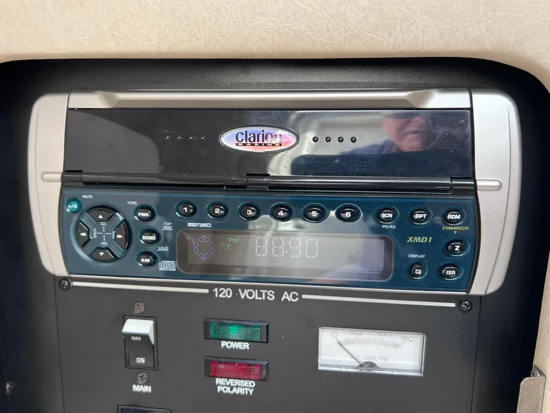 Slide: The Image of Control panel of a 2001 Sea Ray 260 Sundancer boat with Clarion stereo system. - 27