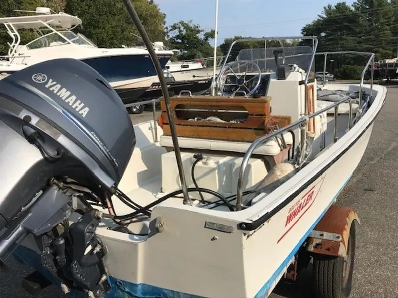 Slide: The Image of 1988 Boston Whaler 170 Montauk with Yamaha outboard motor on trailer. - 8