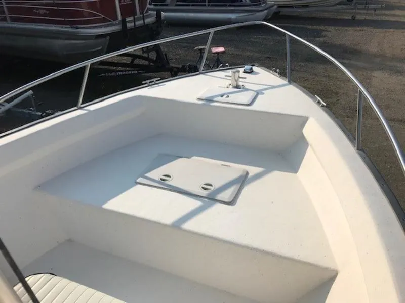 Slide: The Image of 2005 Palm Beach 1801 CC boat deck with storage compartments. - 13