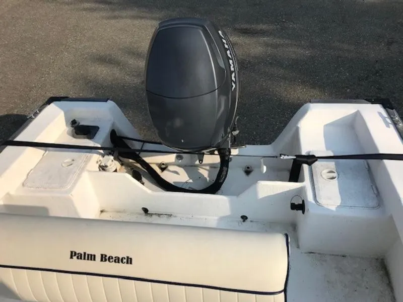 Slide: The Image of 2005 Palm Beach 1801 CC boat with Yamaha outboard motor, rear view. - 2