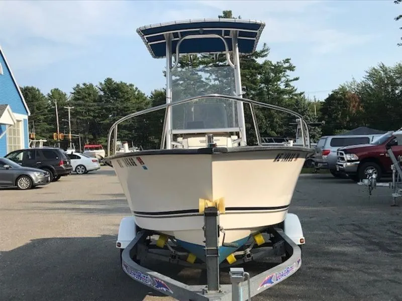 Slide: The Image of 2005 Palm Beach 1801 CC boat on trailer in parking lot. - 9