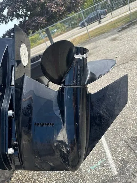 Slide: The Image of Damaged propeller on 2019 Mako 180 CC boat motor in parking lot. - 9