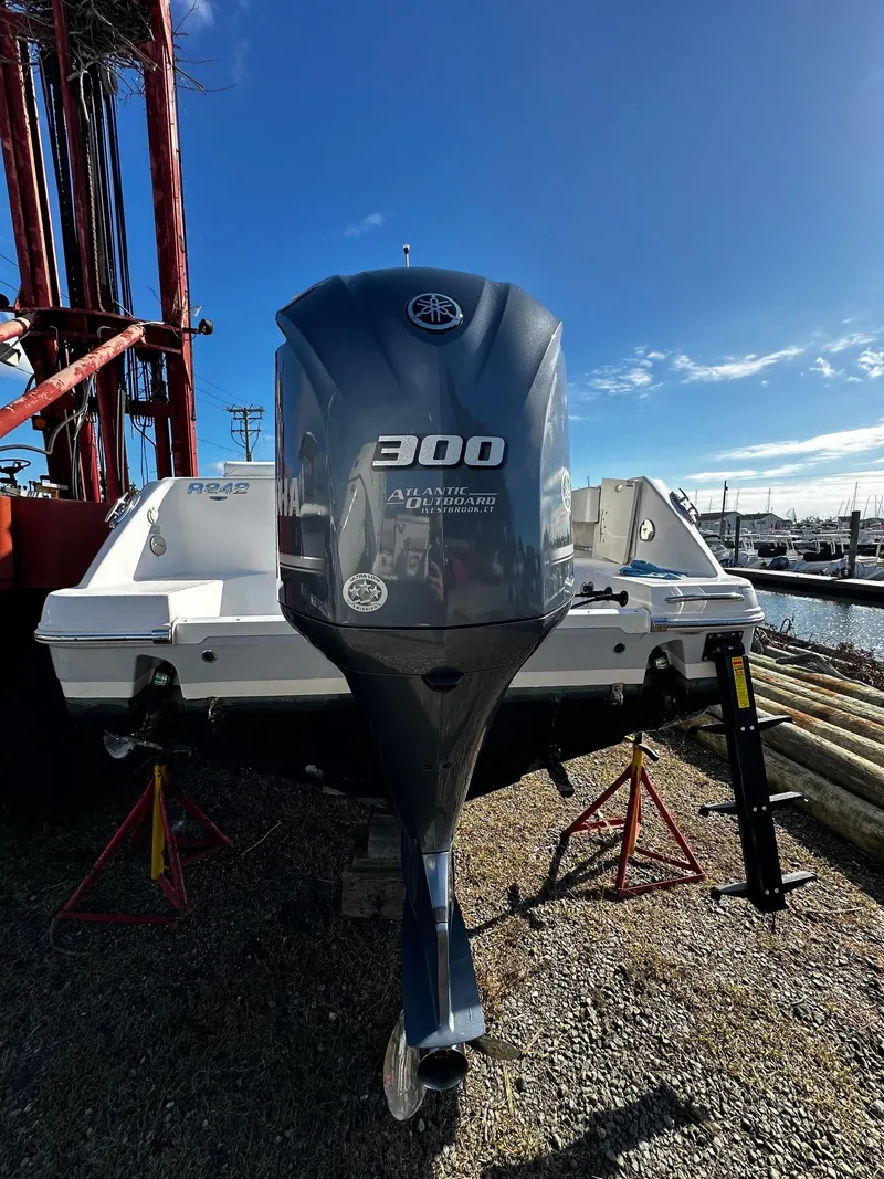 Slide: The Image of 2021 Robalo R242 Center Console with Yamaha 300 outboard engine. - 18