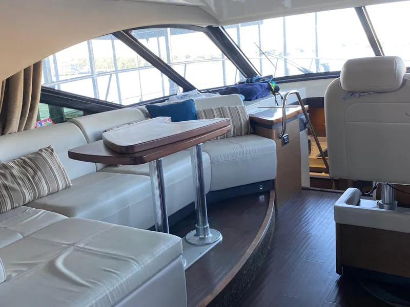Slide: The Image of Luxurious interior of 2015 Sea Ray 510 Sundancer yacht with plush seating and elegant design. - 24
