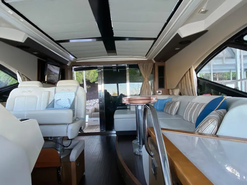 Slide: The Image of Luxurious interior of 2015 Sea Ray 510 Sundancer yacht with plush seating and modern design. - 26