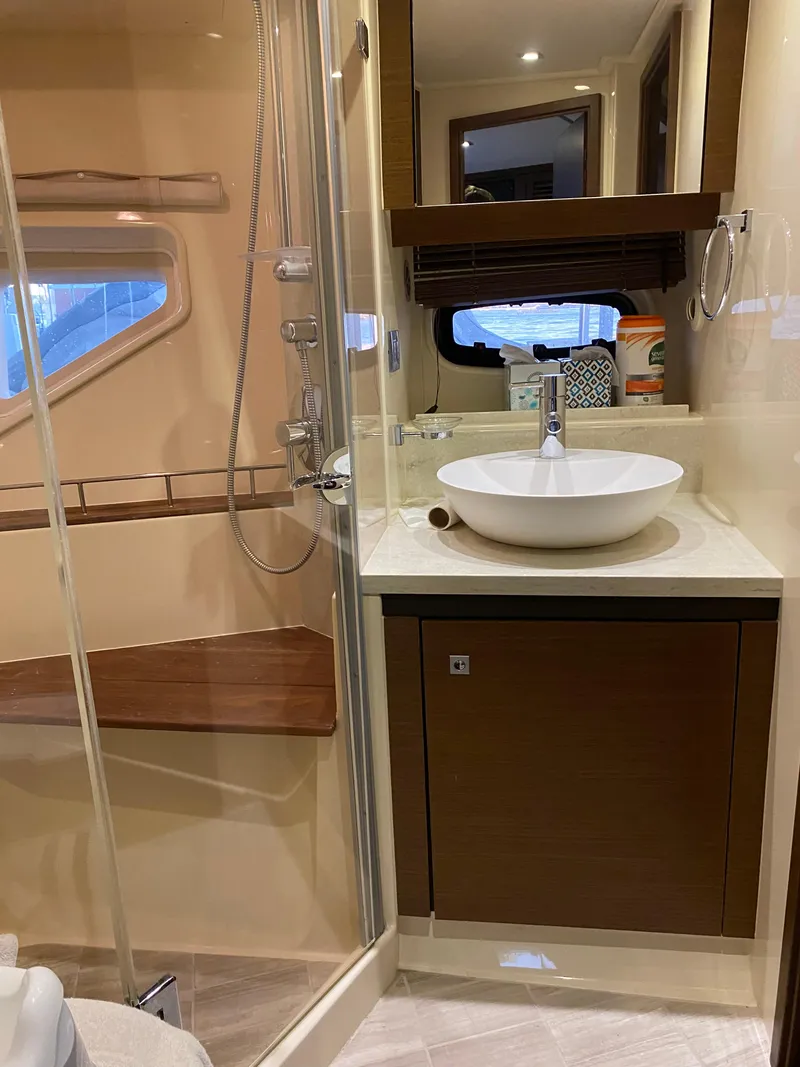 Slide: The Image of Luxurious bathroom in 2015 Sea Ray 510 Sundancer yacht with modern fixtures and shower. - 41