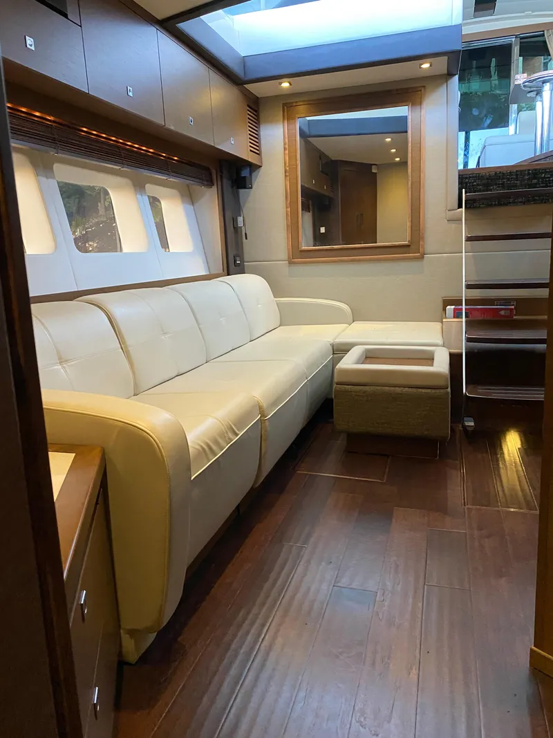Slide: The Image of Luxurious interior of 2015 Sea Ray 510 Sundancer yacht with leather seating. - 43
