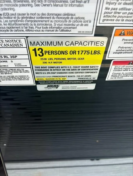 Slide: The Image of Capacity label on 2023 Princecraft QUORUM Q25 boat: 13 persons or 1775 lbs. - 13
