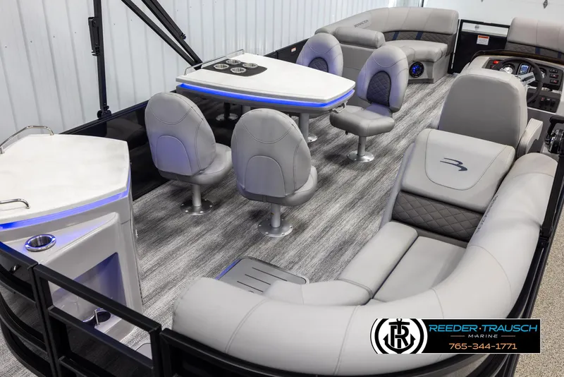 Slide: The Image of 2025 Bennington 23 SXPDSE pontoon boat interior with luxurious seating and modern design. - 12