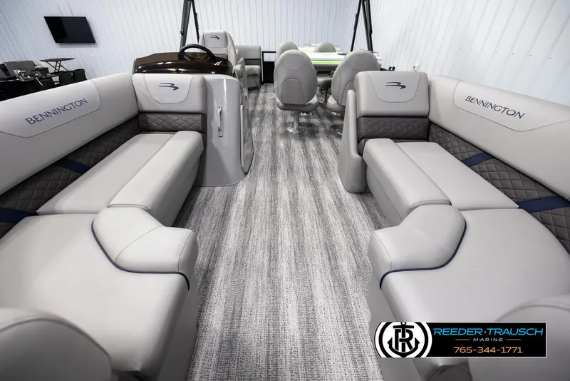 Slide: The Image of Interior of 2025 Bennington 23 SXPDSE pontoon boat with luxurious seating and modern design. - 13