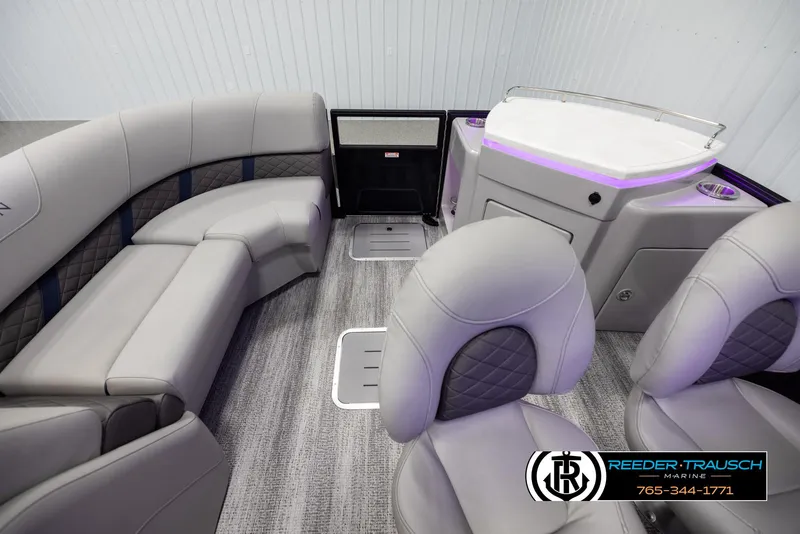 Slide: The Image of Interior of 2025 Bennington 23 SXPDSE pontoon boat with plush seating and modern design. - 15
