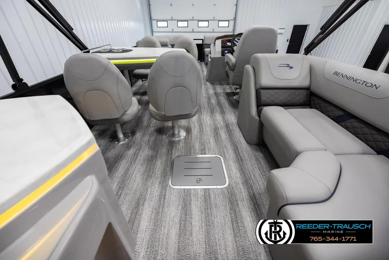 Slide: The Image of 2025 Bennington 23 SXPDSE pontoon boat interior with luxurious seating and modern design. - 16