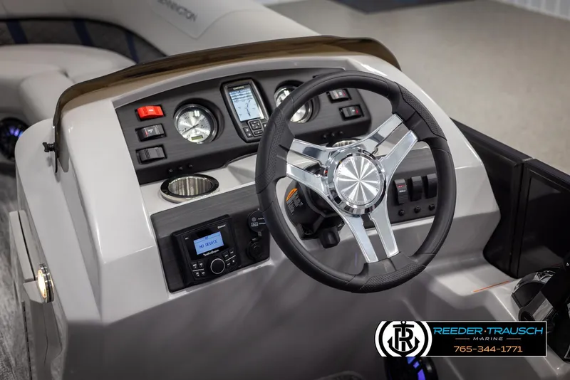 Slide: The Image of Dashboard of 2025 Bennington 23 SXPDSE boat with steering wheel and control panel. - 27