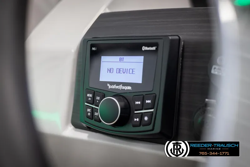 Slide: The Image of Rockford Fosgate Bluetooth stereo system on 2025 Bennington 23 SXPDSE boat dashboard. - 29
