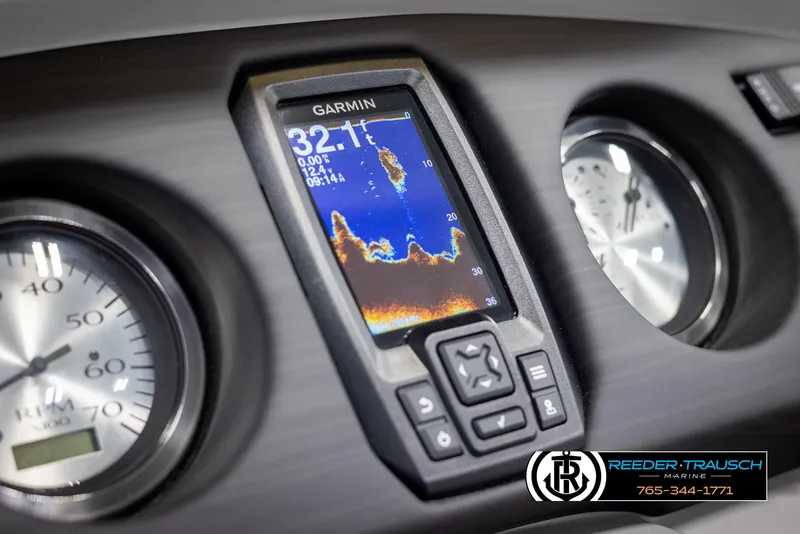 Slide: The Image of Dashboard of 2025 Bennington 23 SXPDSE with Garmin fishfinder and gauges. - 32