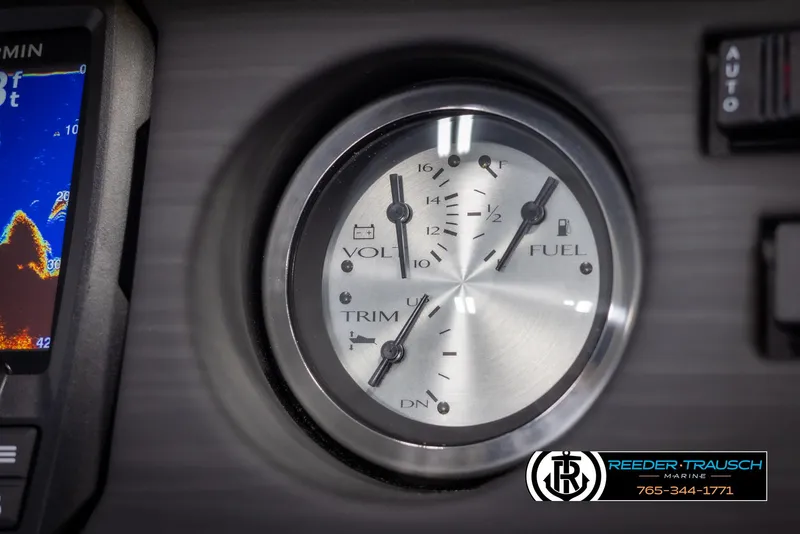 Slide: The Image of Dashboard of 2025 Bennington 23 SXPDSE showing fuel and voltage gauges. - 33