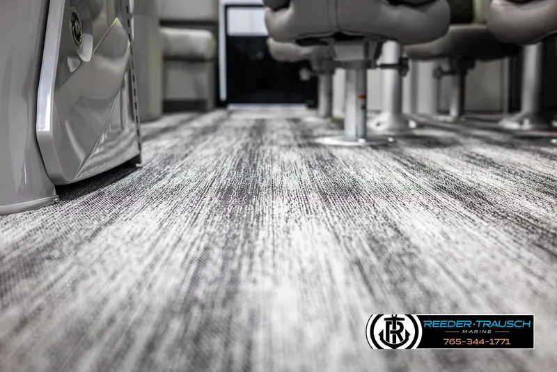Slide: The Image of 2025 Bennington 23 SXPDSE interior flooring, featuring modern design and comfortable seating. - 47