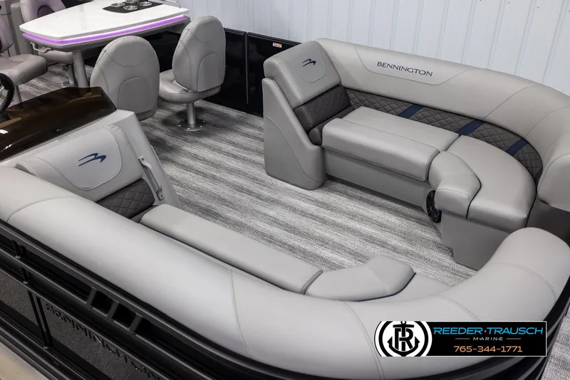 Slide: The Image of 2025 Bennington 23 SXPDSE pontoon boat interior with luxurious seating and modern design. - 9
