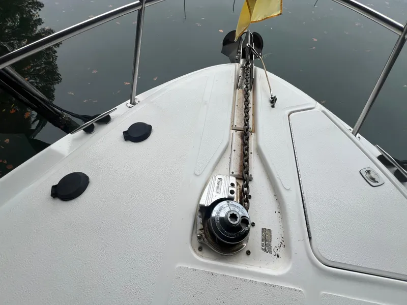 Slide: The Image of Bow of 2000 Sea Ray 380 Aft Cabin with anchor chain and winch. - 8