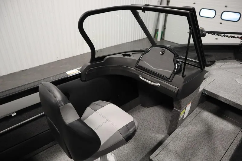 Slide: The Image of 2025 Crestliner 1850 Super Hawk JS boat interior with seating and console. - 29