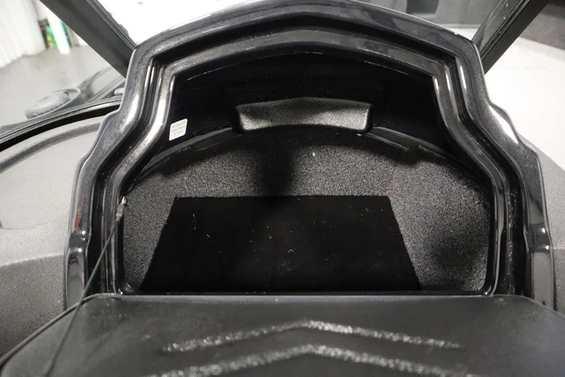 Slide: The Image of 2025 Crestliner 1850 Super Hawk JS storage compartment, open and empty. - 32