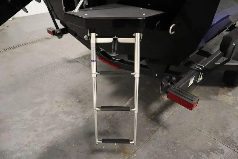 Slide: The Image of 2025 Crestliner 1850 Super Hawk JS boat ladder on concrete floor. - 38